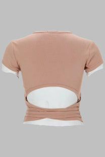 Diesel women’s ribbed dusty rose crop top with short sleeves and white inner layer visible at cuffs and back cutout