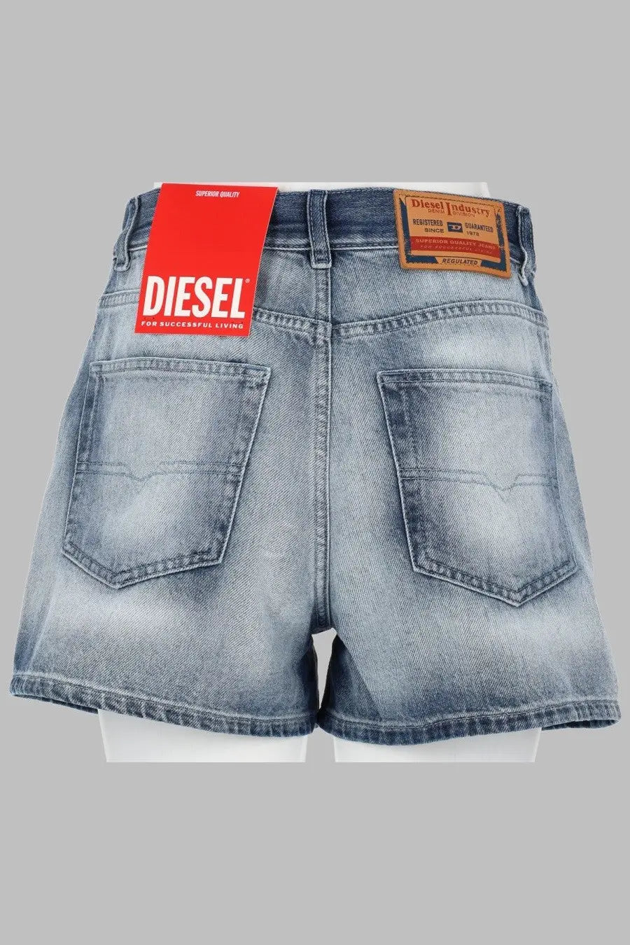 Diesel women’s shorts de helios light-wash denim blue with faded distressed look and classic back pockets shown from back