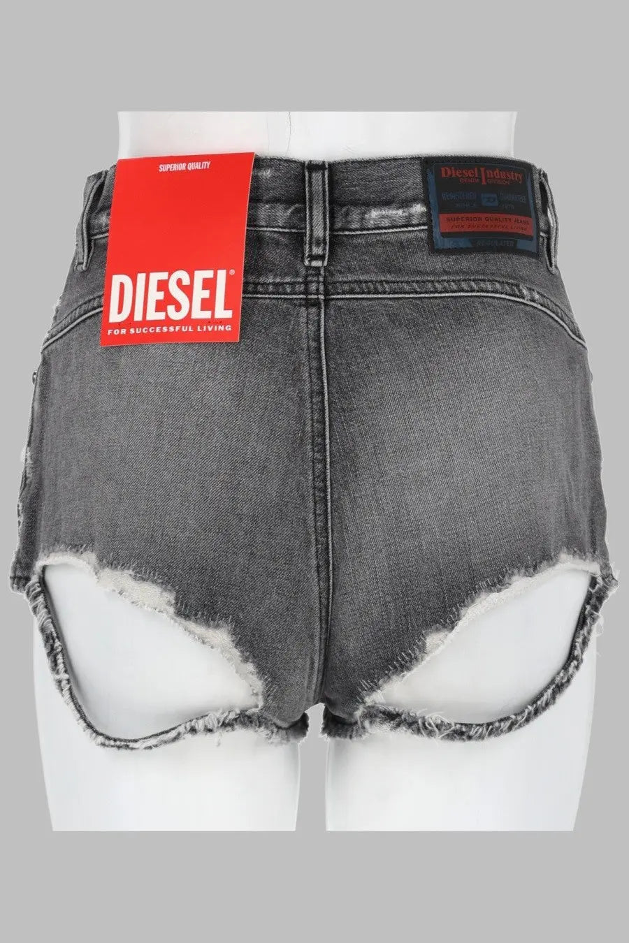 Diesel women’s dark gray distressed denim shorts with frayed edges and red Diesel brand tag in denim con orli sfrangiati grey