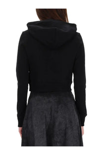 Diesel women’s slimmy sweatshirt black cropped hoodie with soft smooth fabric and snug fit around the shoulders