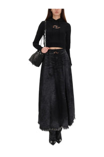 Black velvet maxi skirt with frayed hem and front zipper detail paired with diesel women’s slimmy sweatshirt black