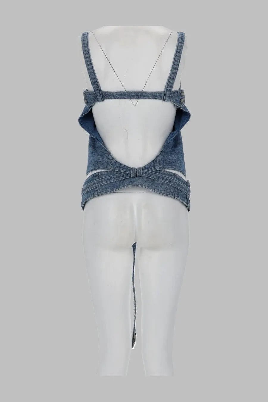 Blue denim crop top with adjustable straps and back cutout design shown from the back by diesel women