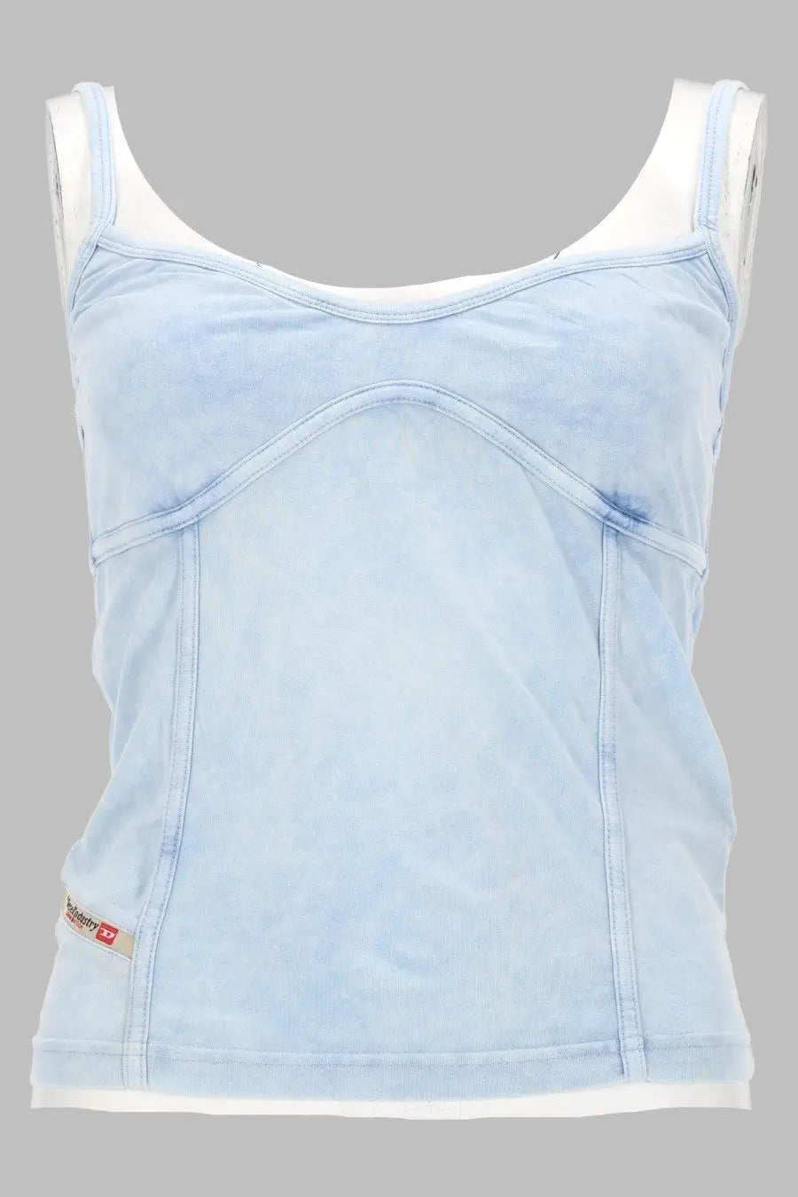 Diesel women’s light blue denim tank top with white trim and subtle distressed texture in denim blue