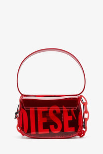 Red transparent tpu shoulder bag by diesel with bold red logo lettering and matching chain strap for women