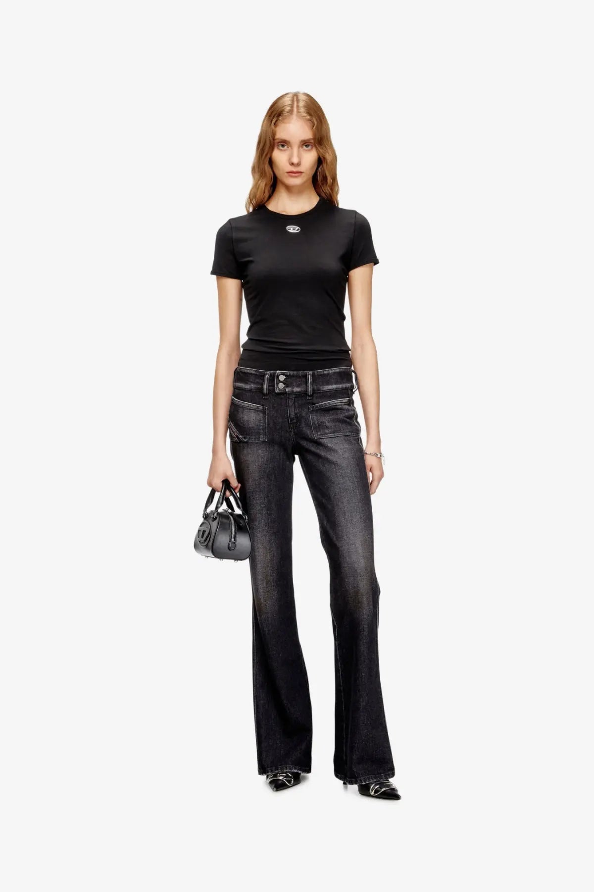 Black denim flare jeans with double-button front and subtle distressing paired with diesel women’s uncutieslong od cotton blend shirt black