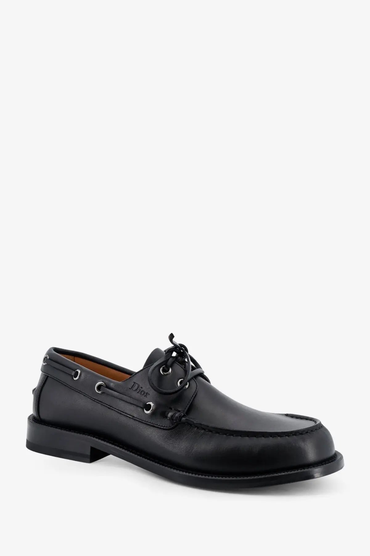 Dior men’s archie leather loafers in black featuring a classic lace-up design with silver eyelets and boat shoe style
