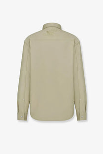 Beige dior men’s cotton shirt with long sleeves and subtle embroidered logo visible on the back collar