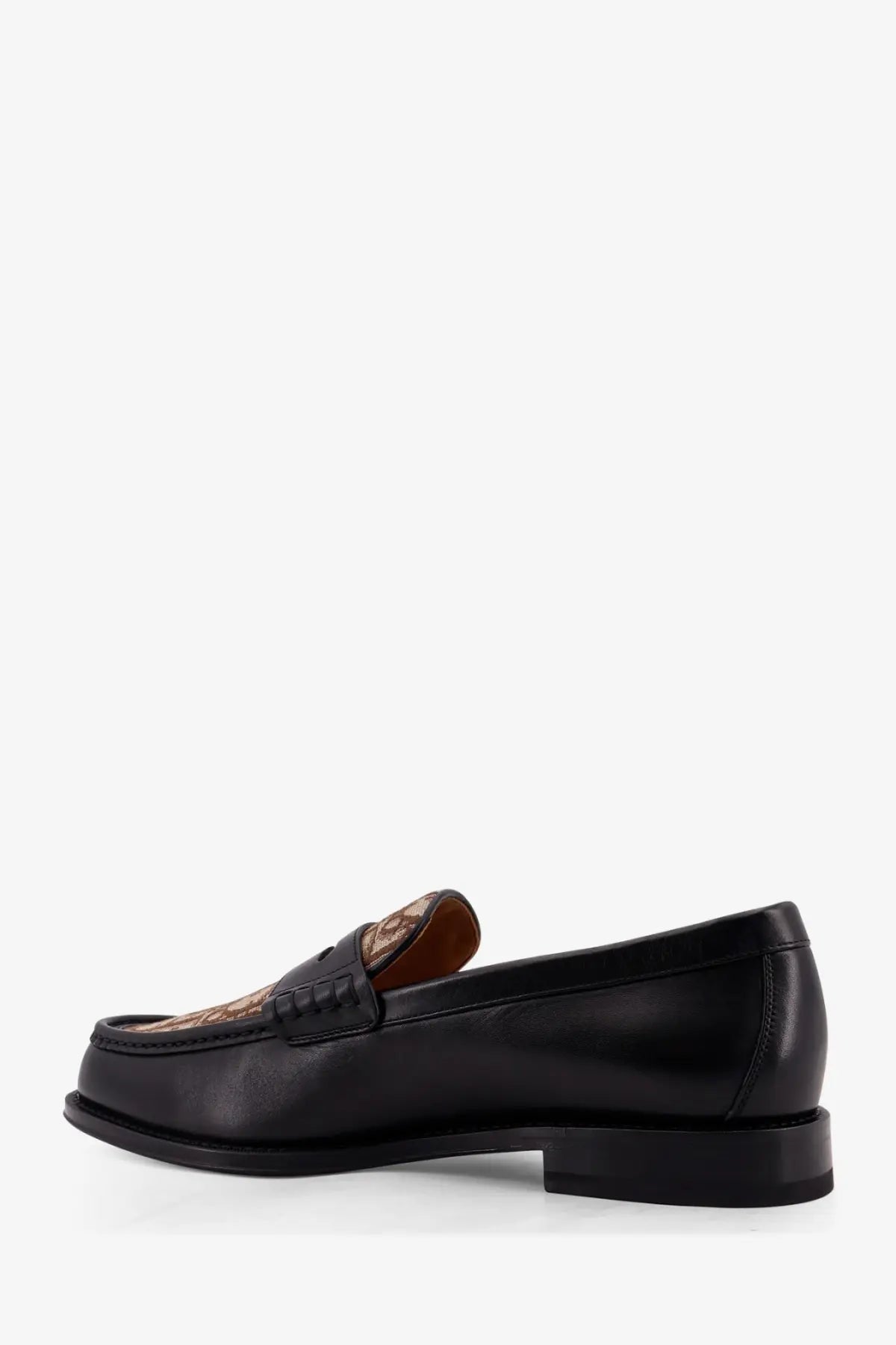 Dior men’s black leather loafer with a tan and brown patterned decorative panel on the toe