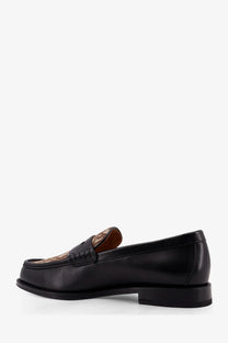 Dior men’s black leather loafer with a tan and brown patterned decorative panel on the toe