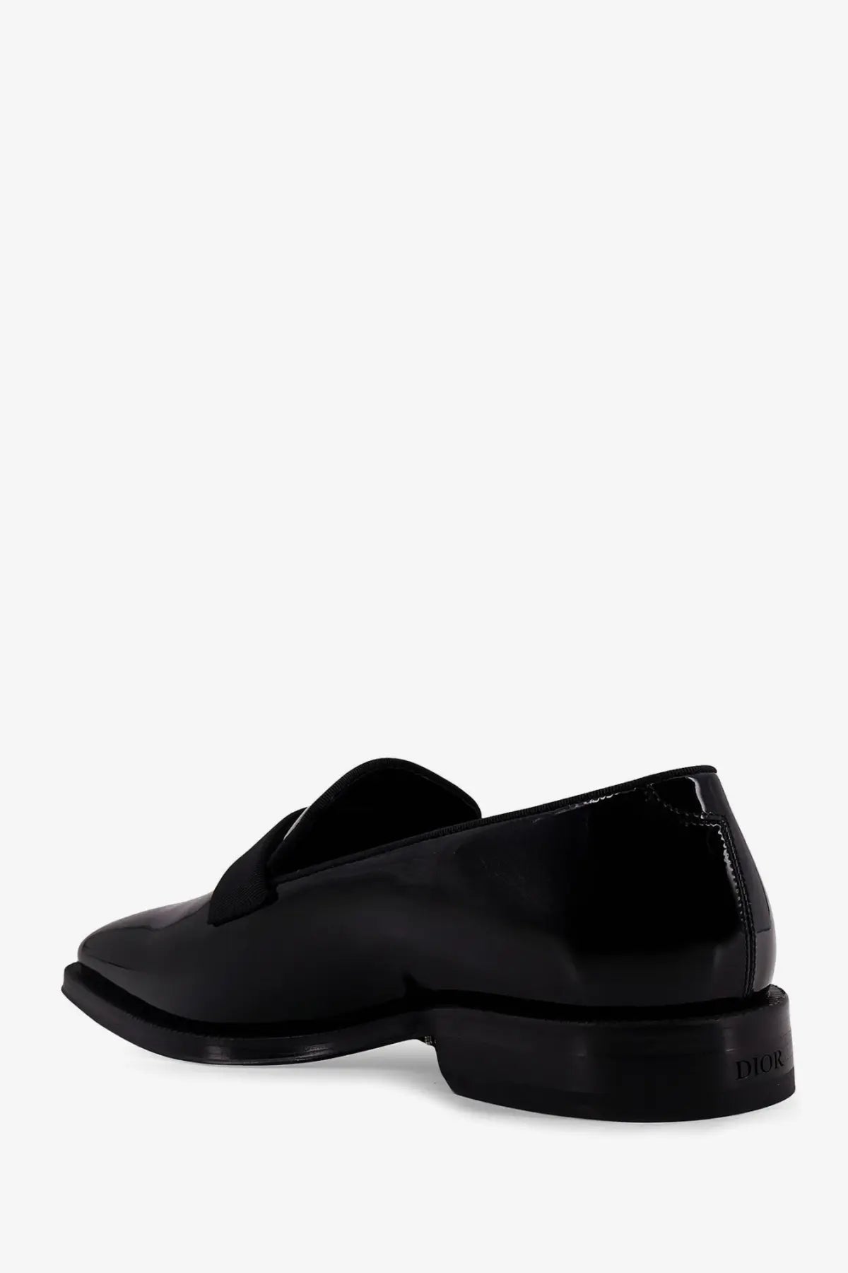 Black patent leather dior men’s palmarè loafers with sleek minimalist design and subtle logo embossed on the heel back side
