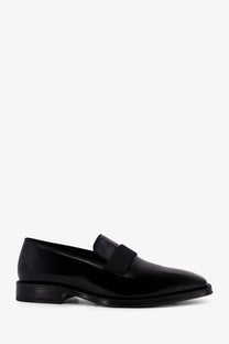Dior men’s Palmarè black patent leather loafer with a sleek minimalist design and square toe