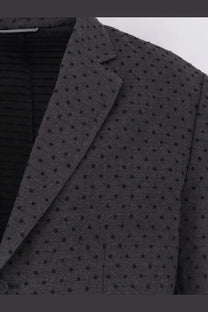 Dark gray dior men’s blazer with subtle black polka dots made from virgin wool and alpaca jacquard fabric