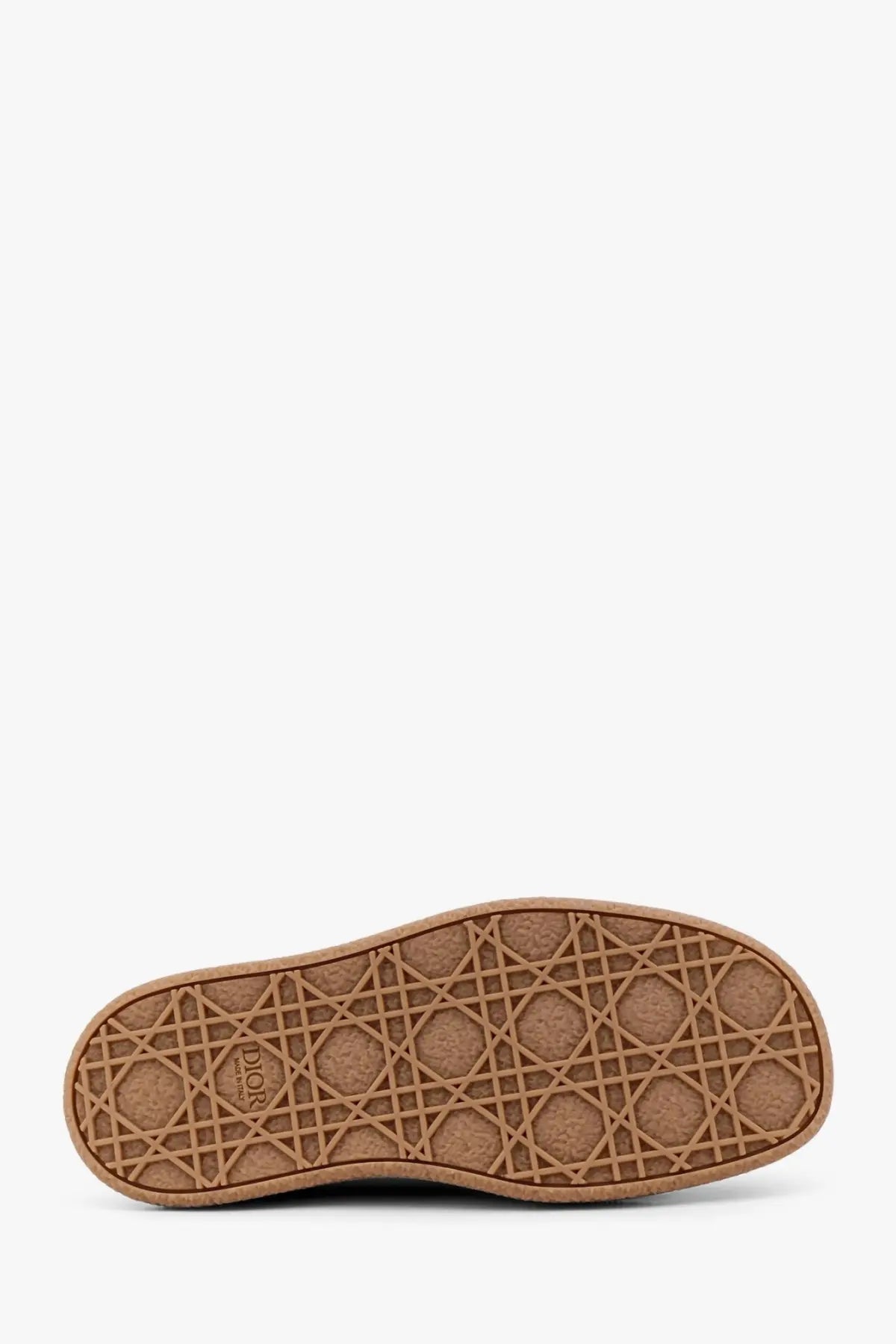 Brown rubber sole with geometric pattern and dior logo embossed near the heel of dior men’s scarpa sahara desert suede brown