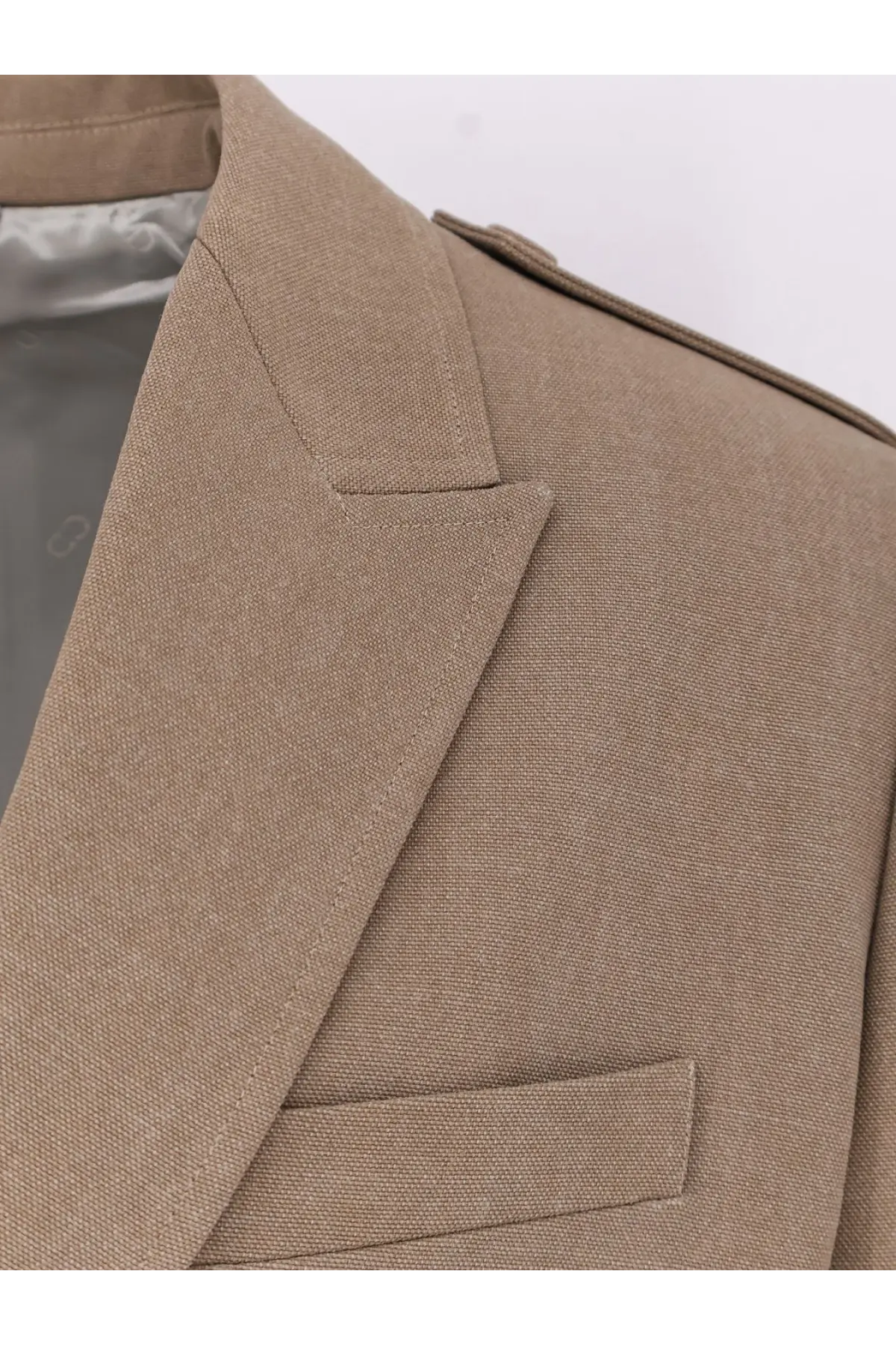Beige textured Dior men’s single breasted virgin wool blazer with notched lapel and flap pocket