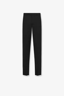 Black tailored Dior men’s slim fit trousers in virgin wool and mohair with sleek straight-leg cut and waistband creasing