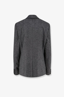 A tailored gray herringbone wool blazer with classic notched collar and buttoned cuffs from Dior men