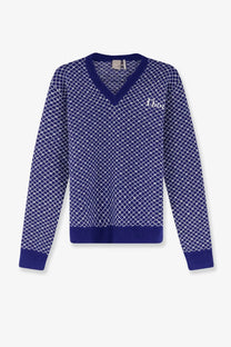 Deep blue Dior men’s wool v-neck sweater with white chain-link pattern and ribbed cuffs