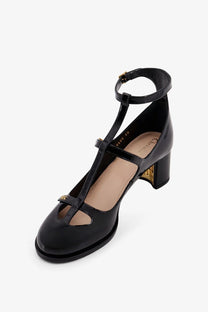 Dior women’s aime dior patent leather mary jane pumps in black with gold-tone heel and ankle strap