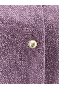 A pearl-like button with silver cd logo on a textured lavender bouclé virgin wool blend blazer by dior women