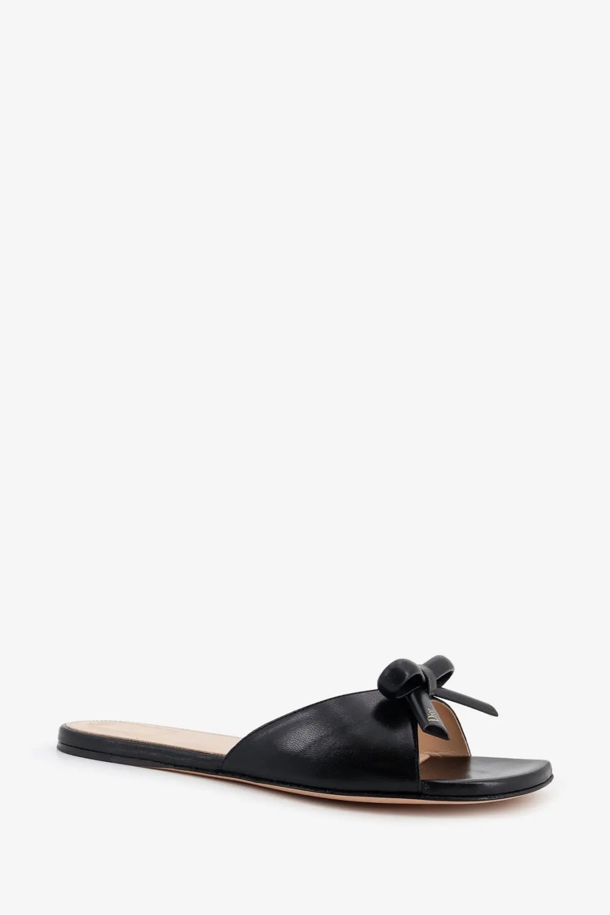 Black leather slide sandal with bow detail from Dior womens Dior bow leather sandals black collection