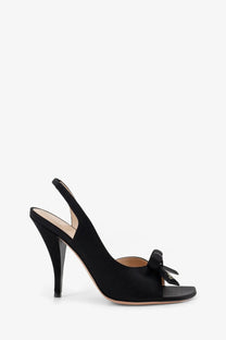 Dior women’s black satin slingback pump with bow detail at the toe from Dior bow satin sandals collection