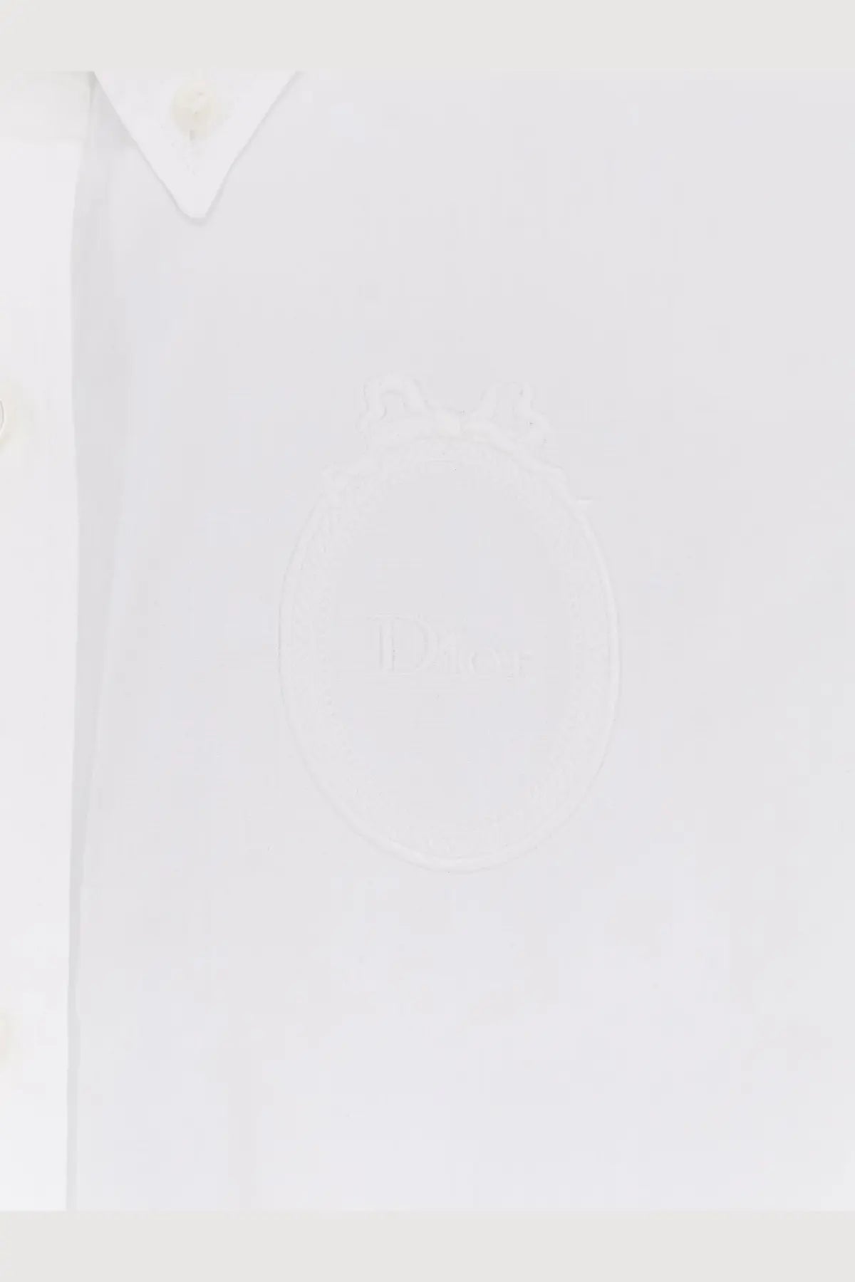 Dior women’s white cotton poplin shirt with subtle embossed logo on the chest