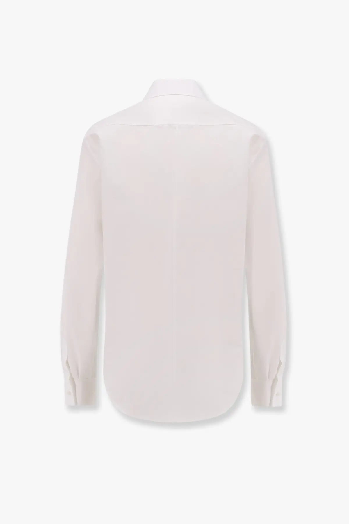 A crisp white Dior women’s cotton shirt with long sleeves, classic collar, and buttoned cuffs