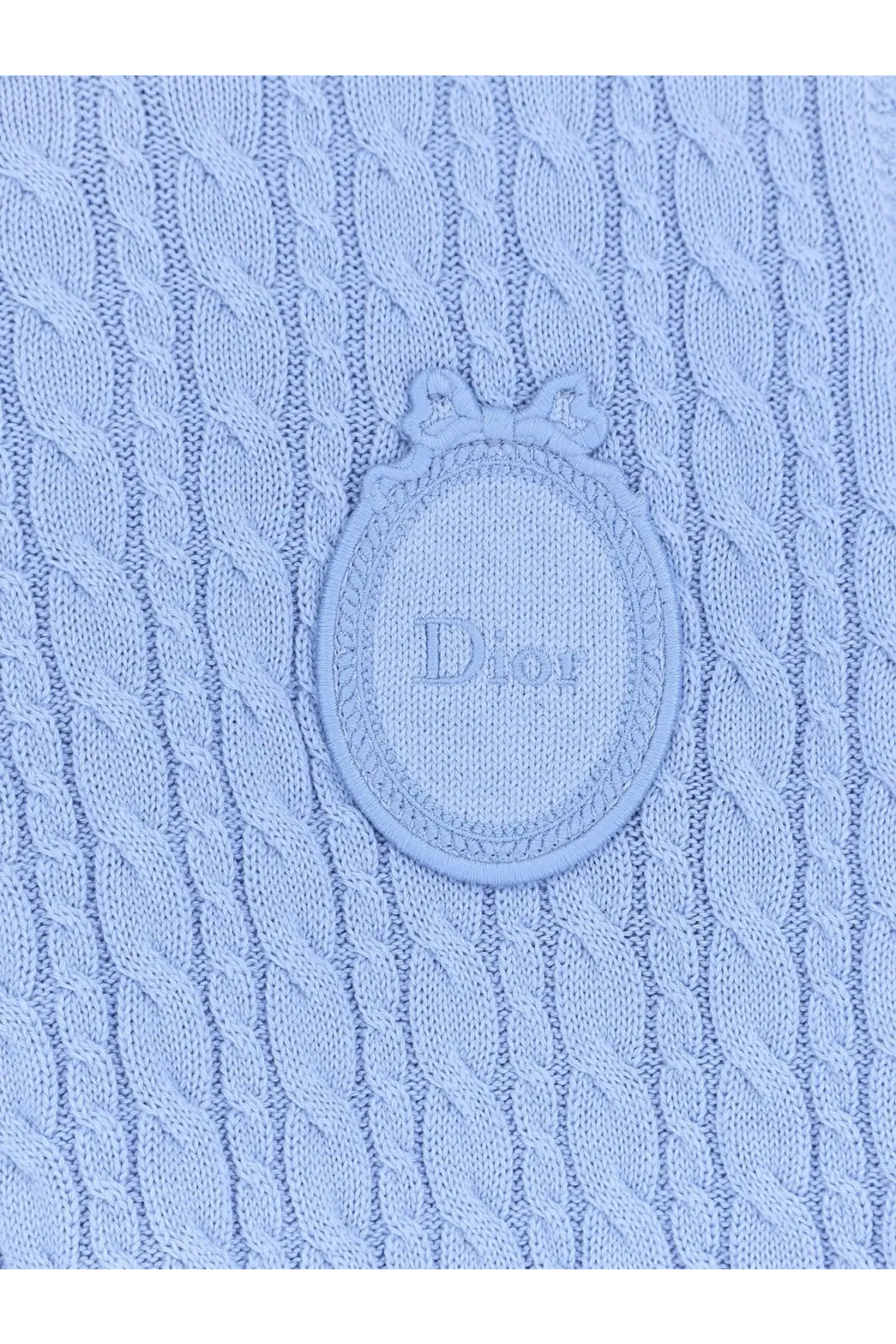 Light blue Dior women’s cotton and wool blend sweater with embroidered Dior logo patch and decorative bow