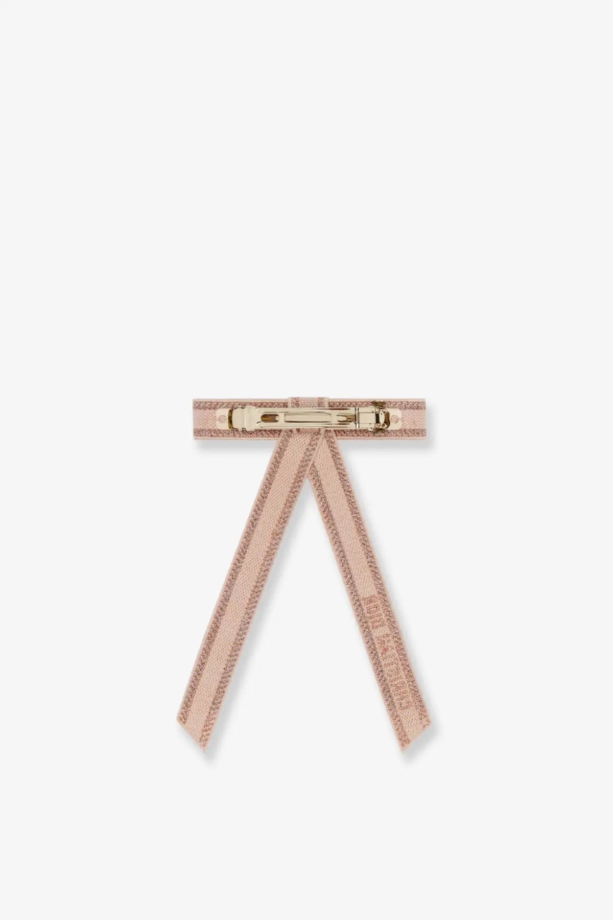 A delicate blush pink Dior women’s Fiocco hair clip with gold-tone metal clasp and subtle glittery texture