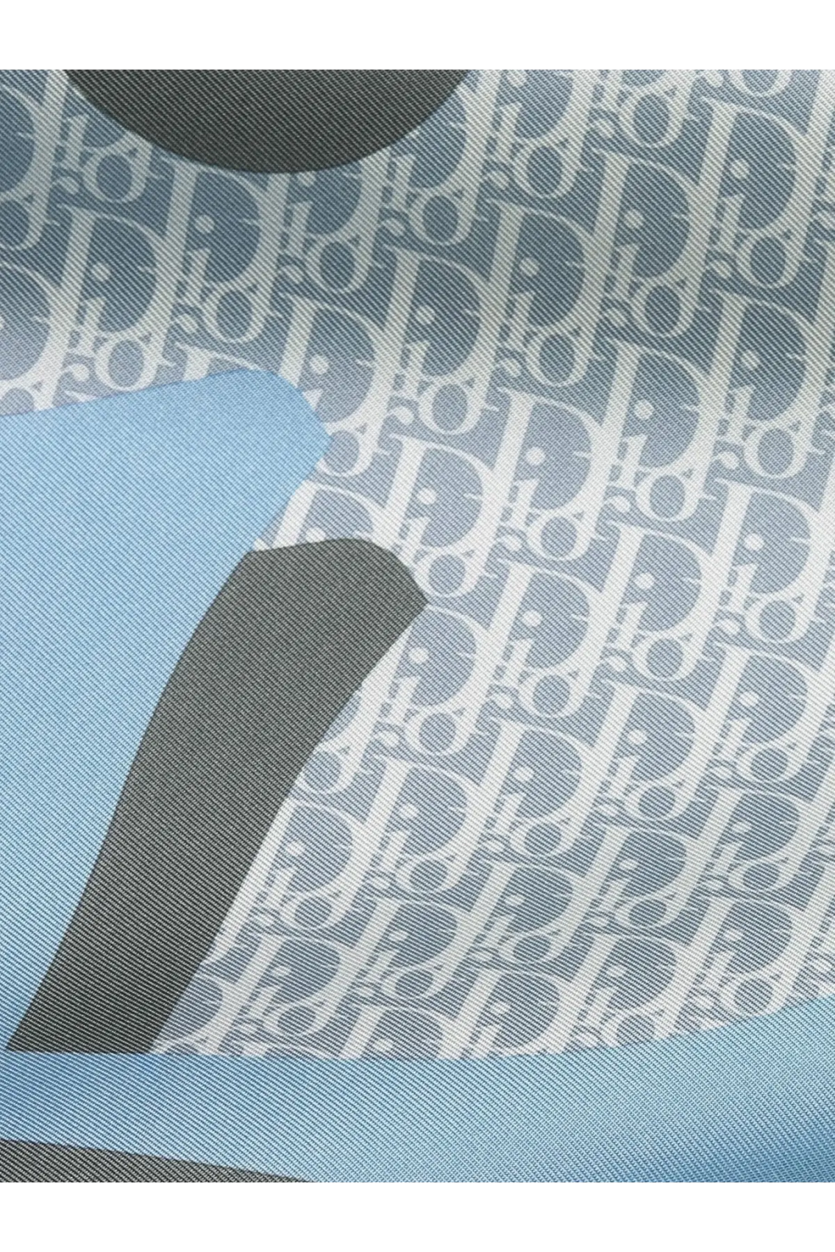Dior women’s Dior Infini Squared foulard blue silk scarf with blue and gray oblique pattern and bold geometric cutouts