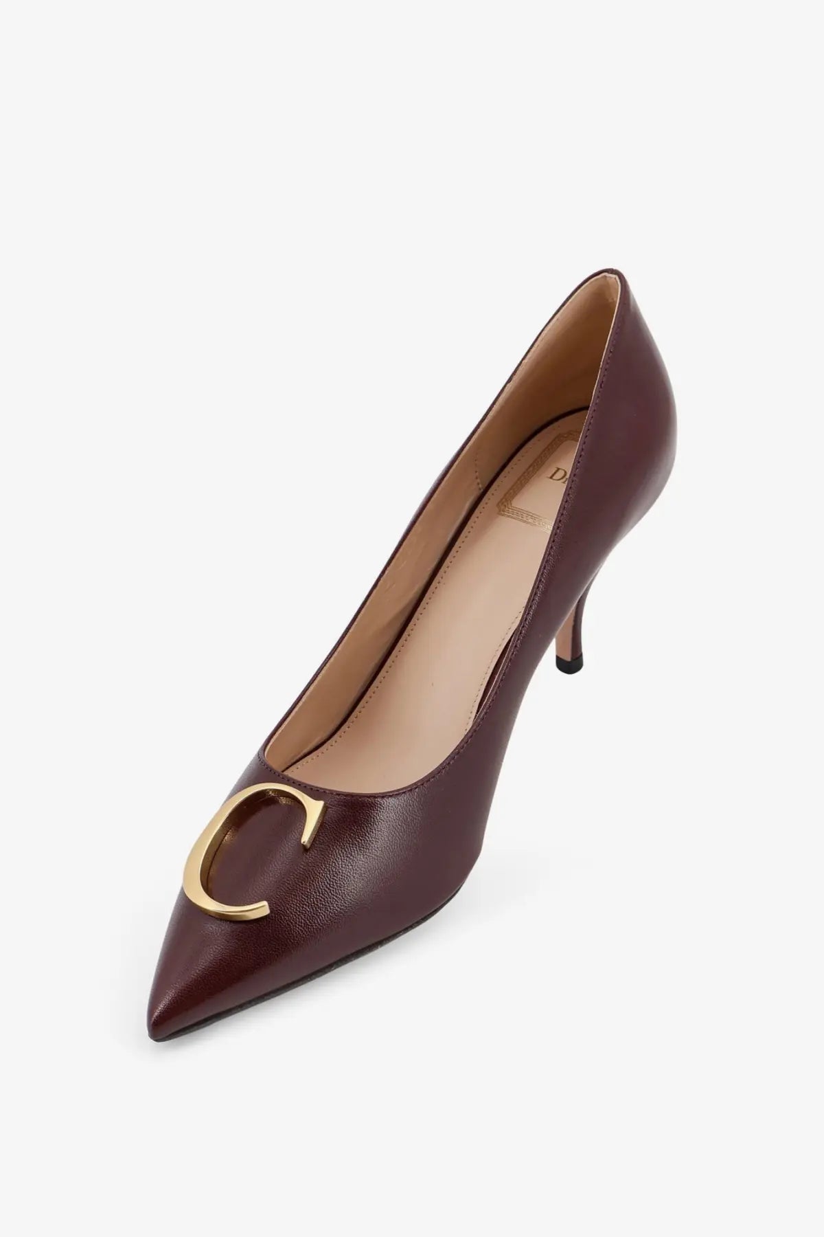 Burgundy leather pump with gold tone c logo accent at the toe, featured in Dior women’s Dior initials leather pumps black