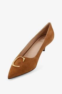 Tan suede dior women’s pump with gold-tone c buckle on the toe in brown color