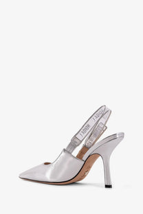 Dior women’s Jadior laminated leather silver slingback pump with a glossy patent leather finish and slender high heel