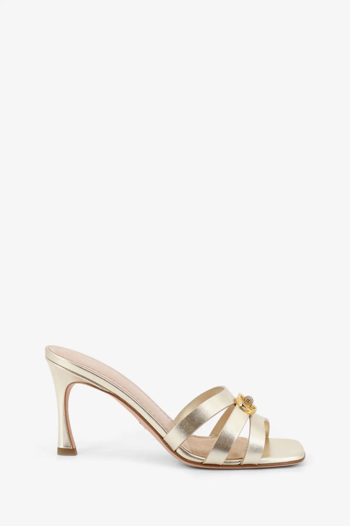 Dior women’s laminated 30m gold leather sandal featuring gold metallic straps, slender heel, and ornate buckle detail