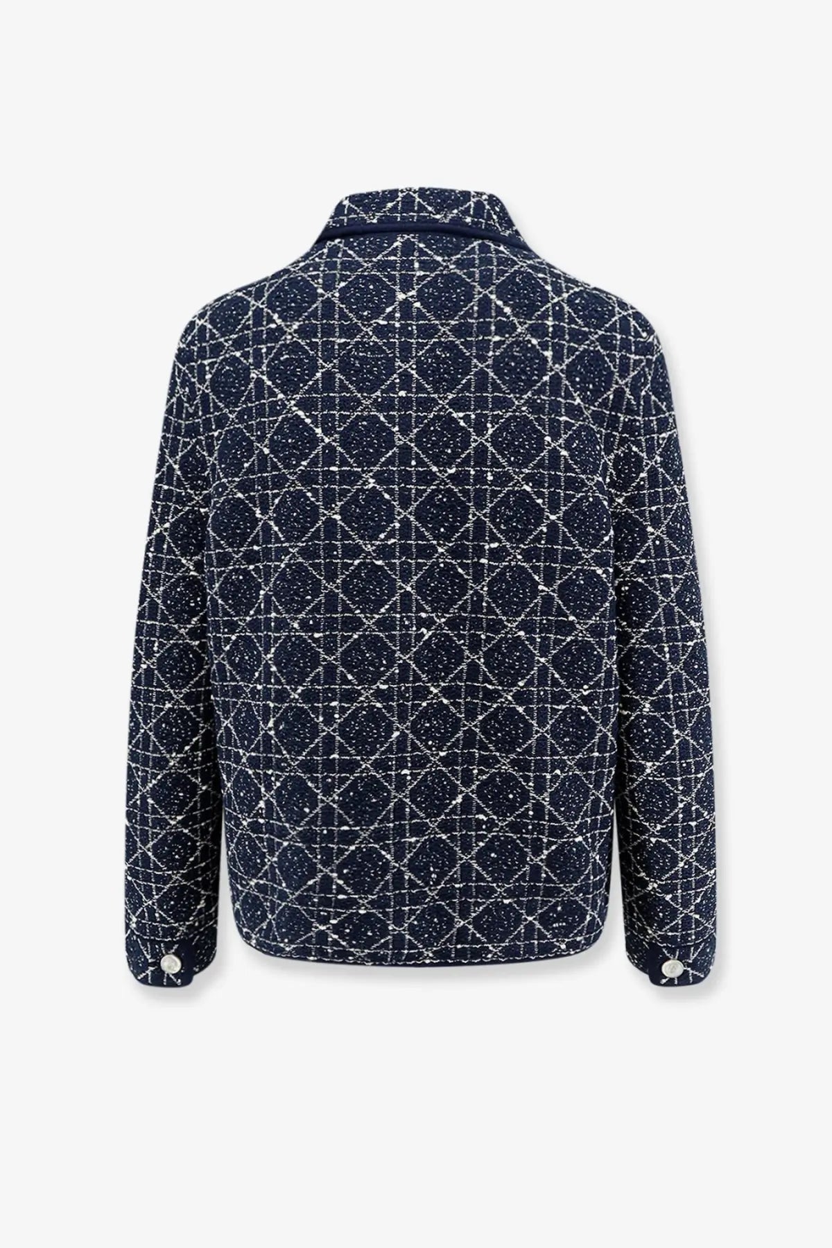 Dark blue tweed Dior women’s Macrocannage blazer with geometric white diamond pattern and silver buttons