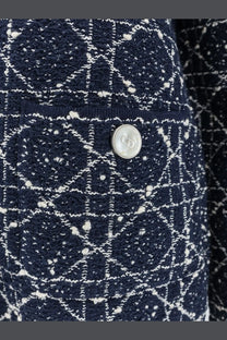 Dior women’s navy blue and white tweed blazer with geometric pattern and silver Dior logo button
