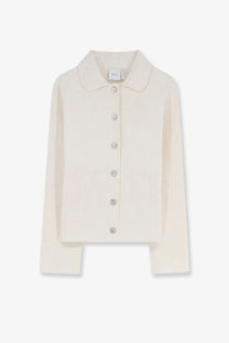 Cream-colored dior knit cardigan with classic collar and silver buttons paired with white dior oblique fabric blazer