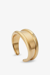 Gold Dior cuff bracelet with sleek modern design and polished finish in Dior women’s Dior Rocks metal bracelet gold