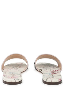 Dior women’s Sandalo Dway con multicolor beige floral-print slide sandals with soft pink strap and dark brown sole