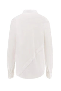 Back side of a crisp white Dior women’s long-sleeved shirt with subtle diagonal seam detail