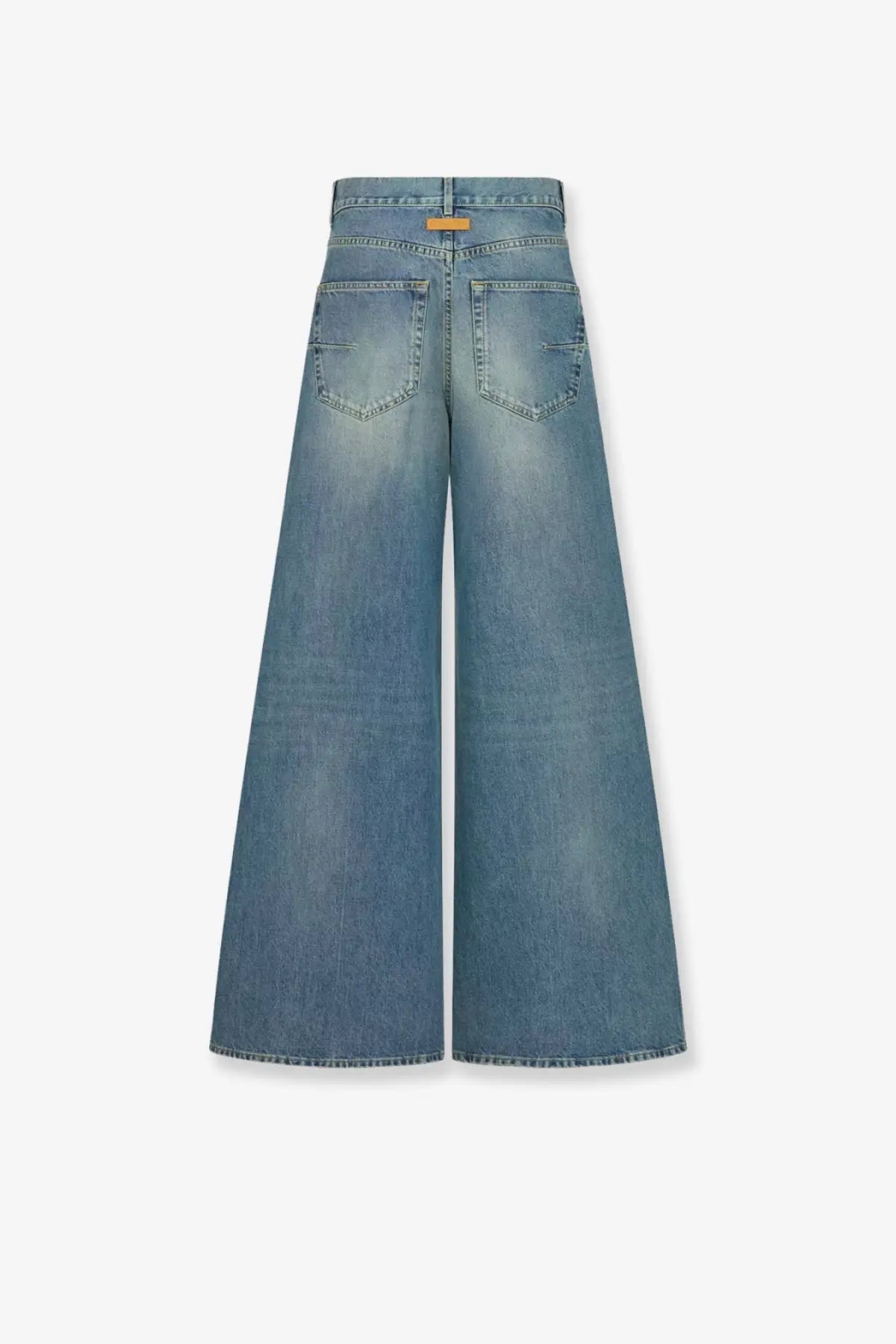Back view of dior women’s stone washed light-wash denim wide-leg jeans with classic pocket and subtle brand tag