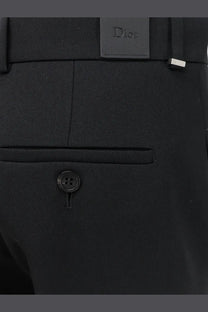 Black dior women’s virgin wool tailored trousers with sleek textured fabric and subtle stitching details