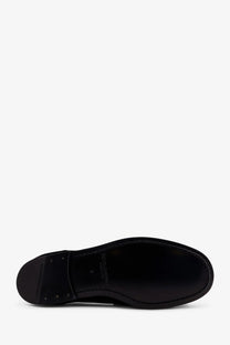 Black leather sole of dolce &amp; gabbana men’s ariosto suede loafers with smooth glossy finish and visible stitching