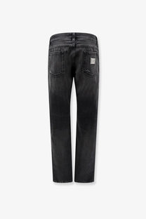 Back view of dolce and gabbana men’s black denim trousers featuring faded wash and subtle distressing on back pockets