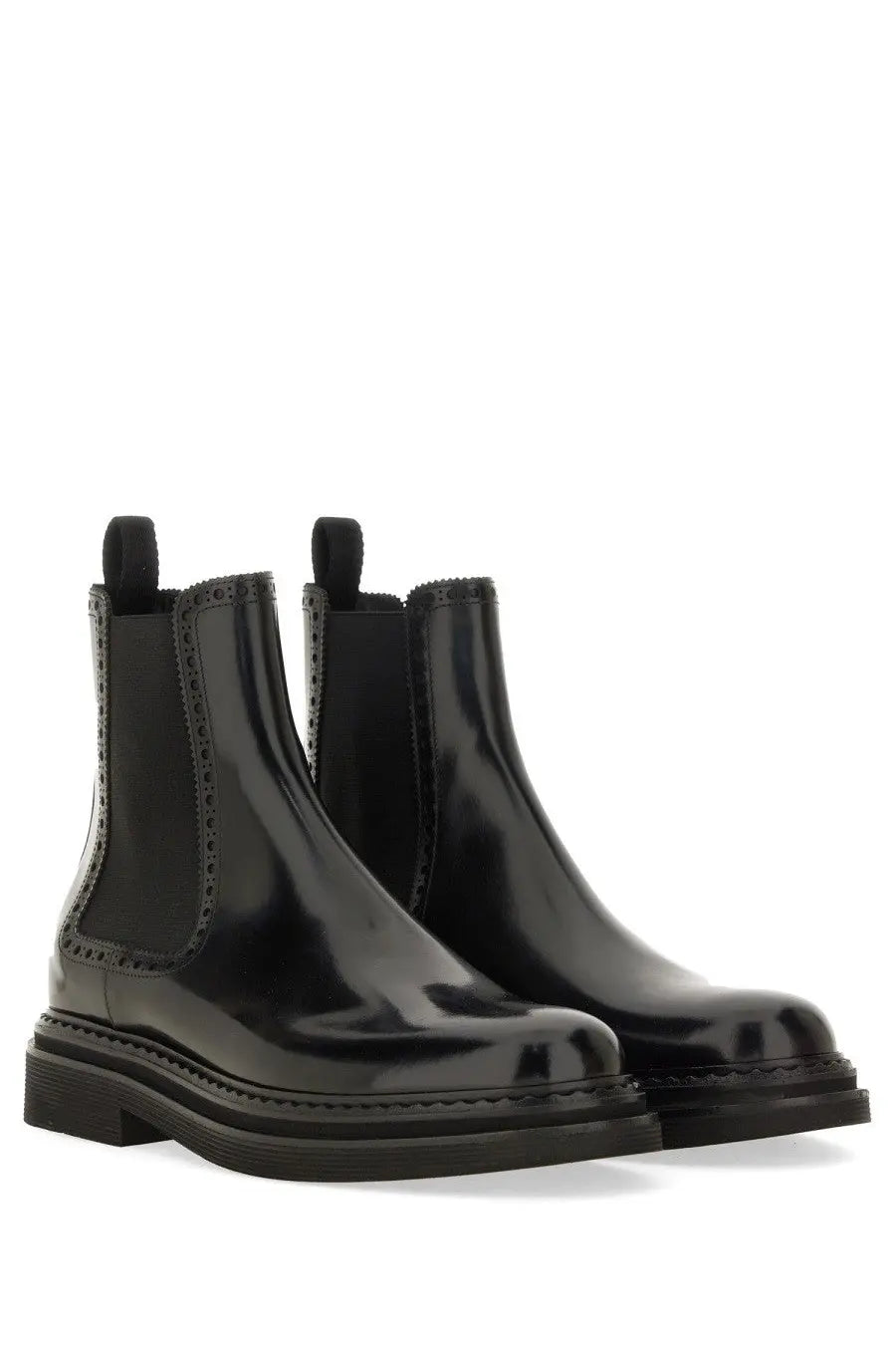 Dolce &amp; Gabbana men’s black patent leather chelsea boots with glossy finish and decorative brogue detailing