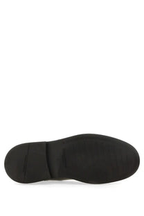 Black rubber sole with subtle grooves and smooth textured surface on dolce &amp; gabbana men’s brushed leather boot black