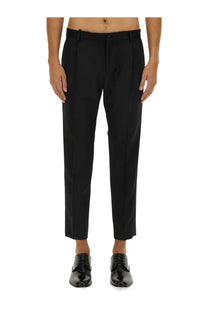 Dolce &amp; Gabbana men’s classic black tailored trousers with sleek straight-leg cut and subtle pleats at the waistband