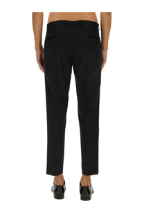 Dolce &amp; Gabbana men’s classic black tailored trousers with sleek straight-leg cut and subtle creases