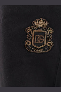 Dolce &amp; Gabbana men’s black cotton bermuda shorts with gold embroidered crest crown and Milano inscription