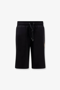 Dolce &amp; Gabbana men’s black cotton bermuda shorts with drawstring waistband and subtle gold logo on the side